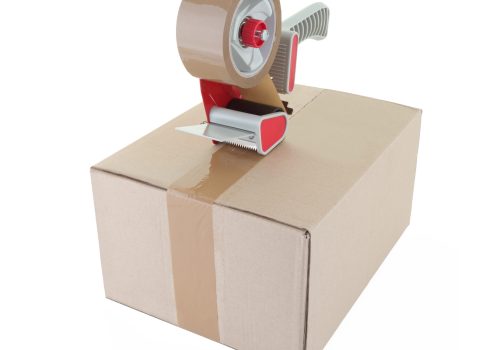 Tape,Gun,And,Cardboard,Box,On,White,With,Clipping,Path
